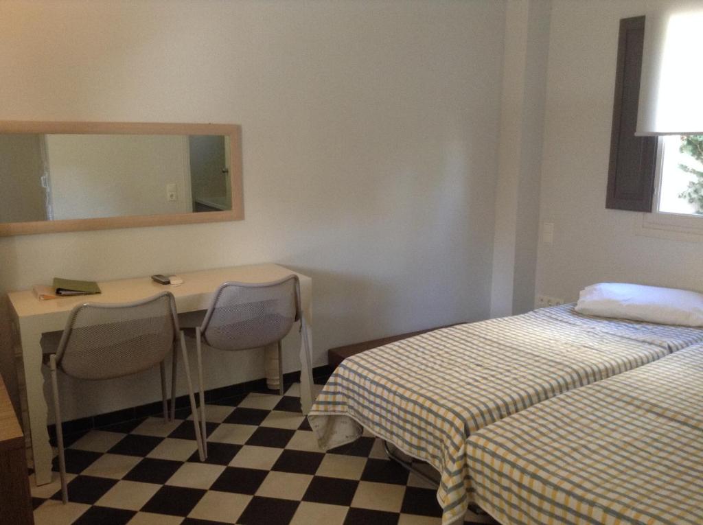 Postel nebo postele na pokoji v ubytování Rose Bay Hotel