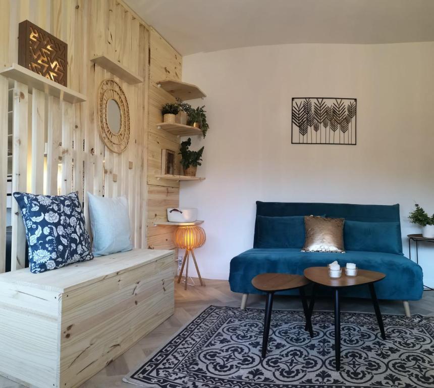 Posezení v ubytování Cozy Woodland Oasis - Superbe appartement rénové, calme et lumineux - BEC