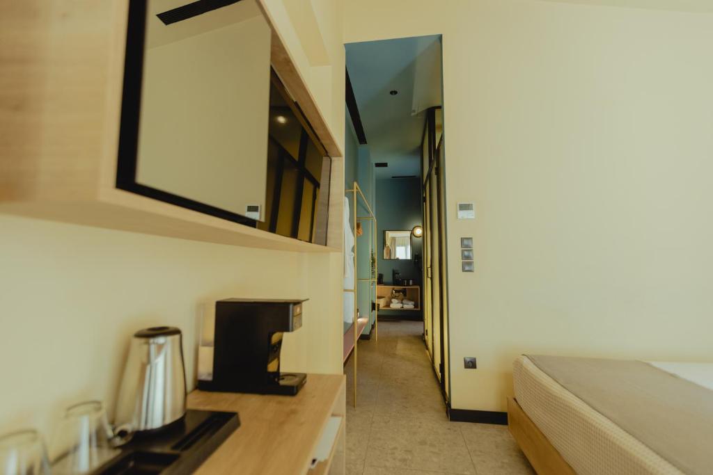 Posteľ alebo postele v izbe v ubytovaní Metis Urbane Living Spaces