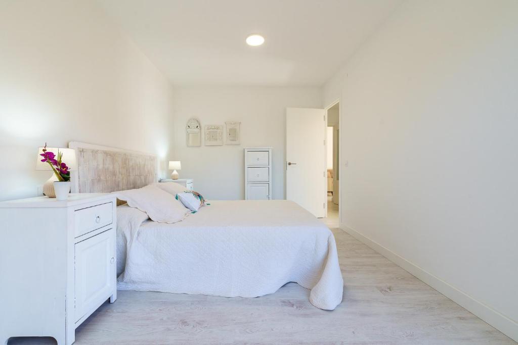 Postel nebo postele na pokoji v ubytování MalagaSuite Living Coast Fuengirola
