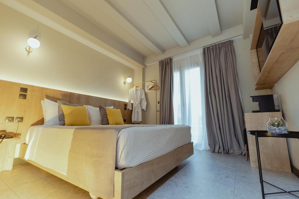 Televízia a/alebo spoločenská miestnosť v ubytovaní Metis Urbane Living Spaces