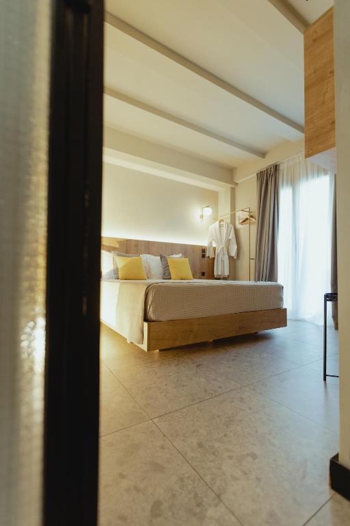 Posteľ alebo postele v izbe v ubytovaní Metis Urbane Living Spaces
