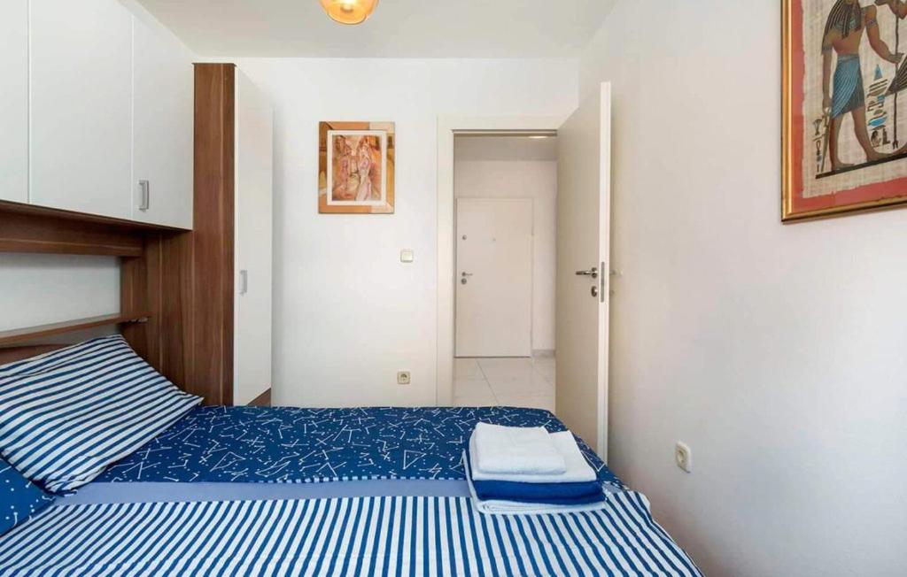 Łóżko lub łóżka w pokoju w obiekcie Apartment Valsaline 2182