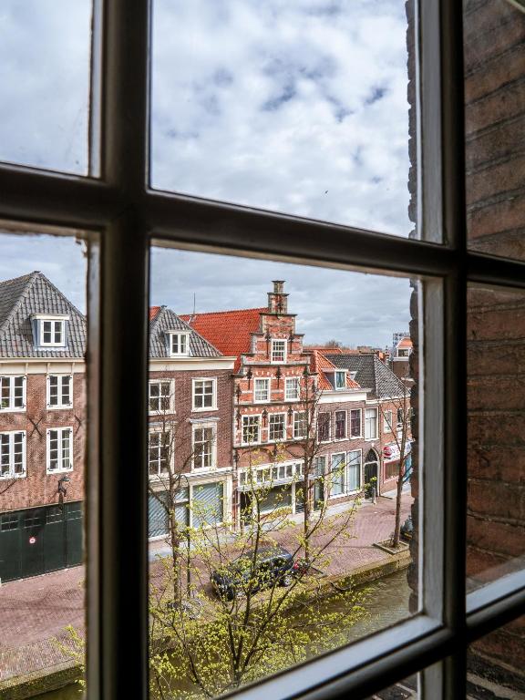 Nespecifikovaný výhled na destinaci Delft nebo výhled na město při pohledu z hotelu