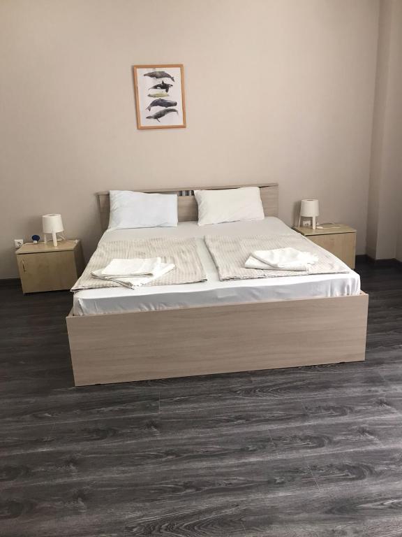 Postel nebo postele na pokoji v ubytování Apartments na Beregu
