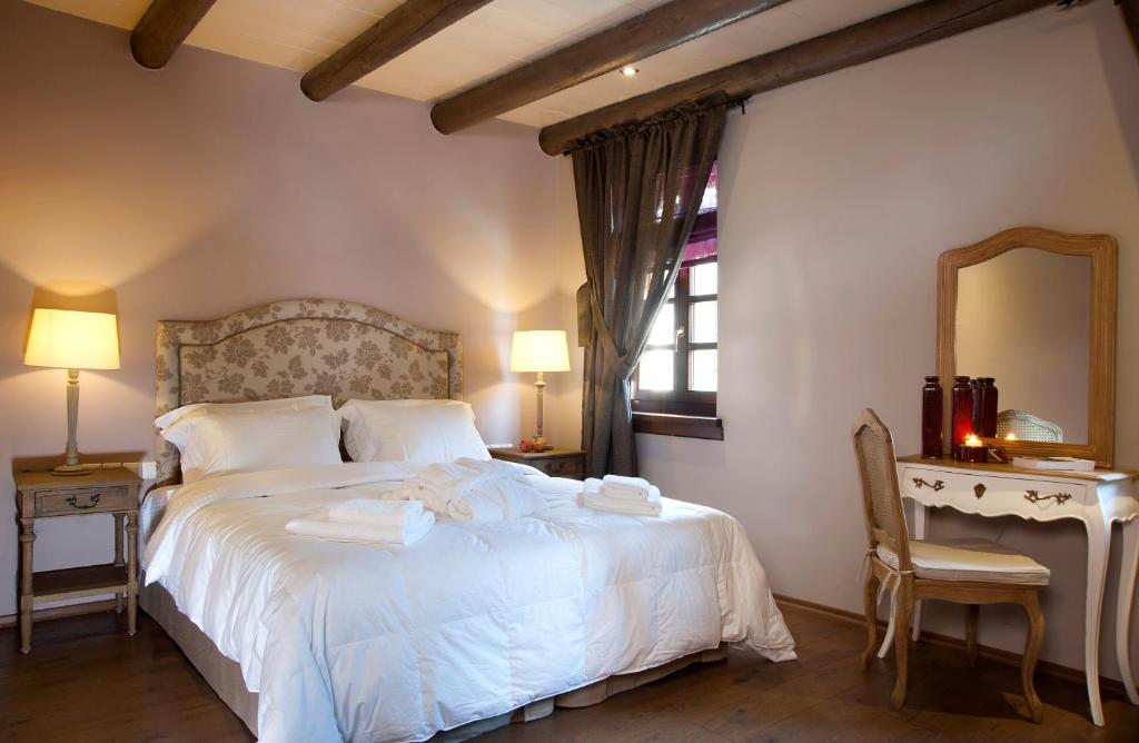 Postel nebo postele na pokoji v ubytování Aberratio Boutique Hotel