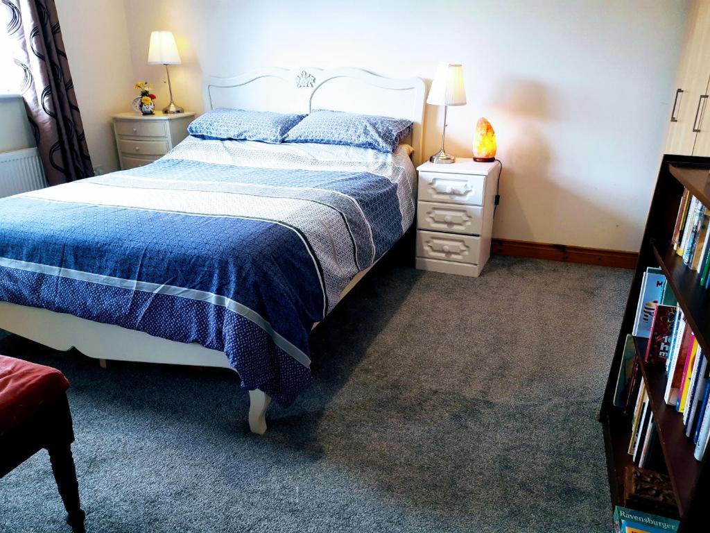 Postel nebo postele na pokoji v ubytování Sunny Haven