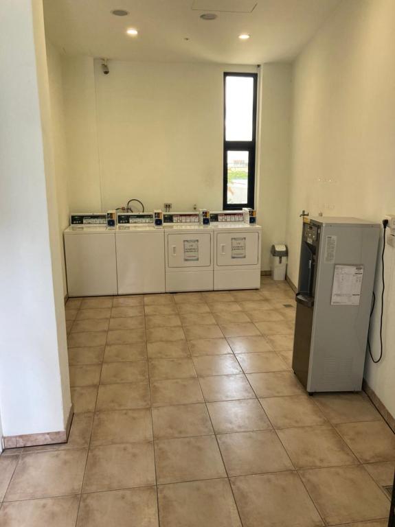 Kuchyň nebo kuchyňský kout v ubytování Wei Feng Hotel - Kaohsiung