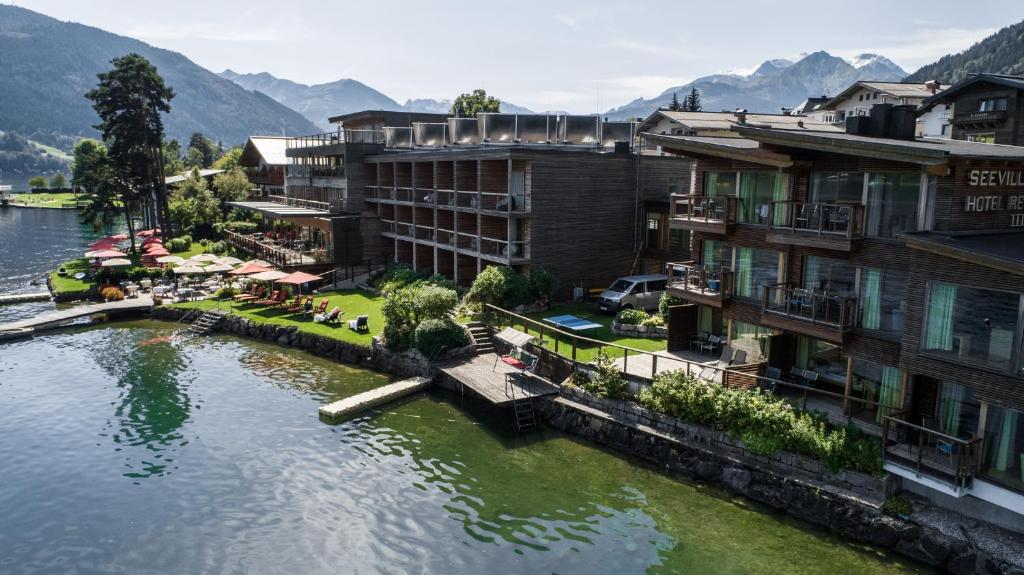 an aerial view of a resort on a river at Seevilla Freiberg in Zell am See