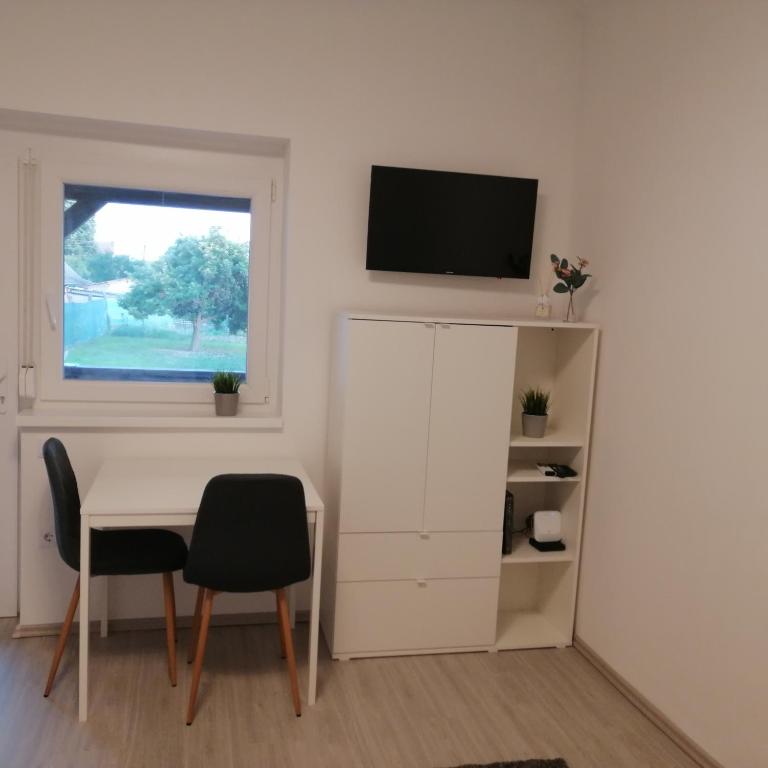 TV a/nebo společenská místnost v ubytování Werner Apartman