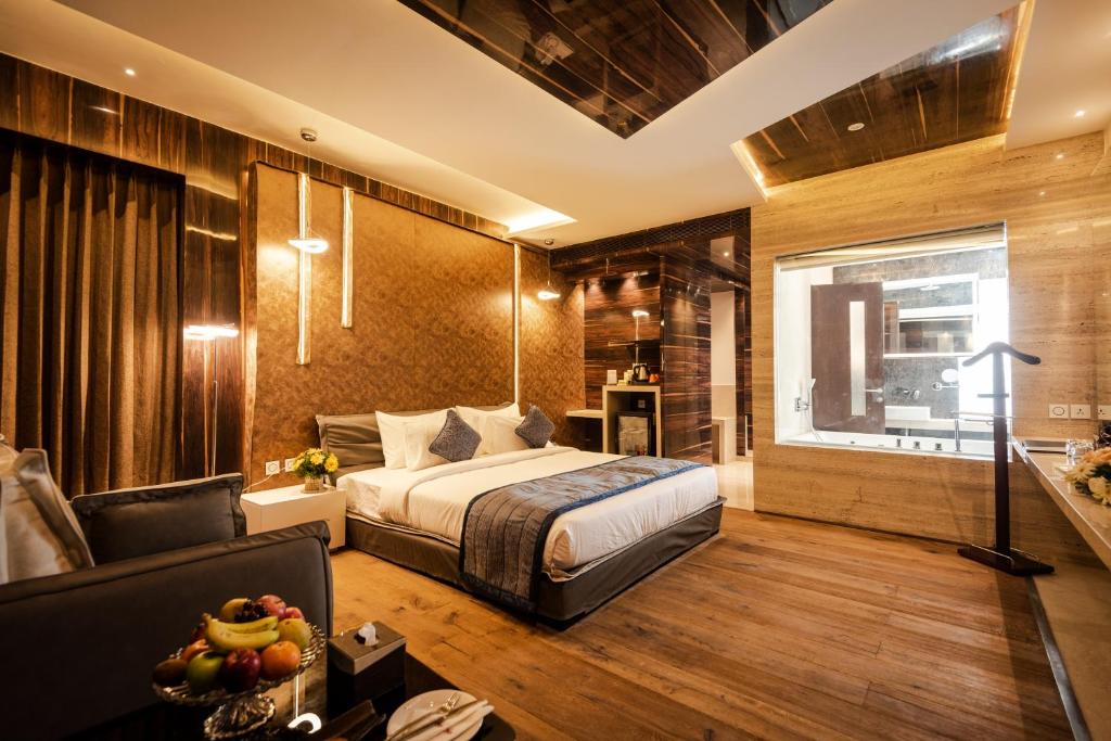 Postel nebo postele na pokoji v ubytování Hotel Park Elanza Coimbatore