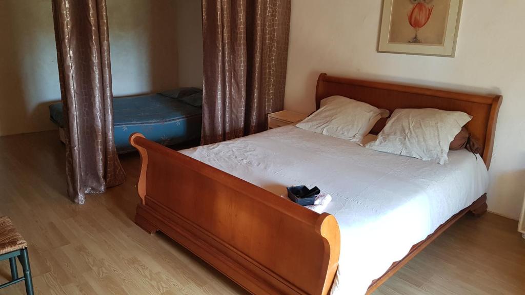 Posteľ alebo postele v izbe v ubytovaní Chambre chez habitant 4 Personnes à la ferme de Lupin