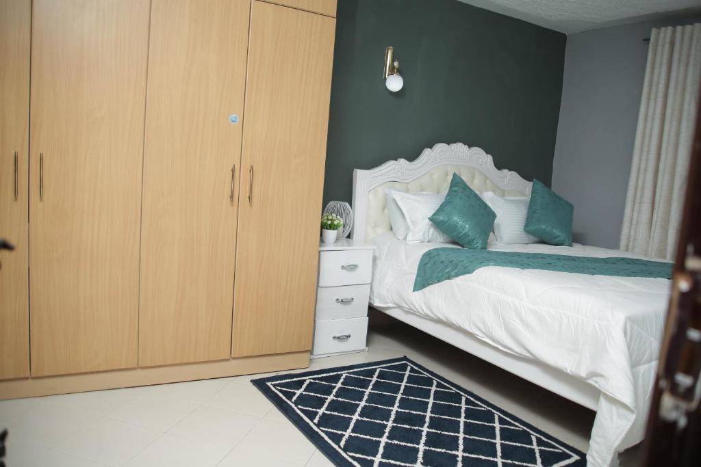 Postel nebo postele na pokoji v ubytování Parkview apartments