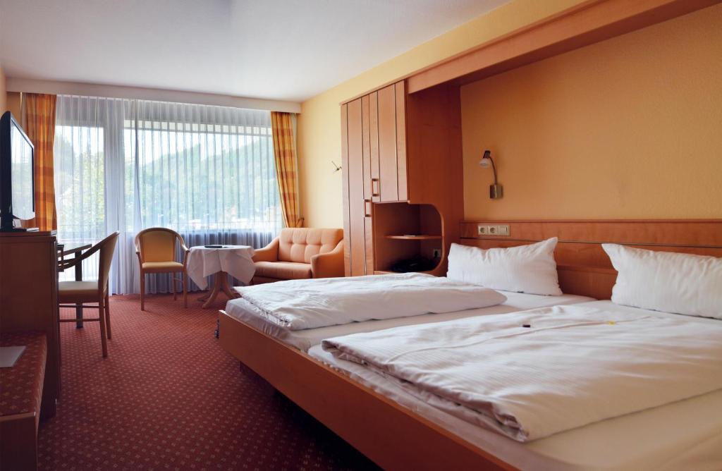 Postel nebo postele na pokoji v ubytování Hotel Kloster Hirsau