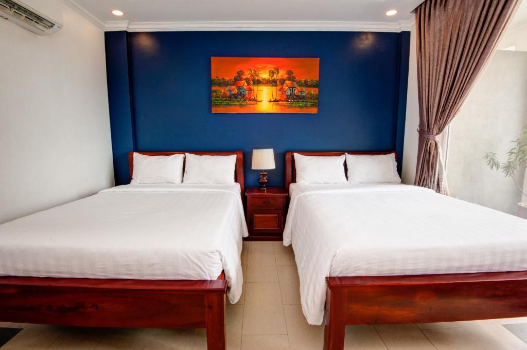 Postel nebo postele na pokoji v ubytování Mad Monkey Hostel Siem Reap
