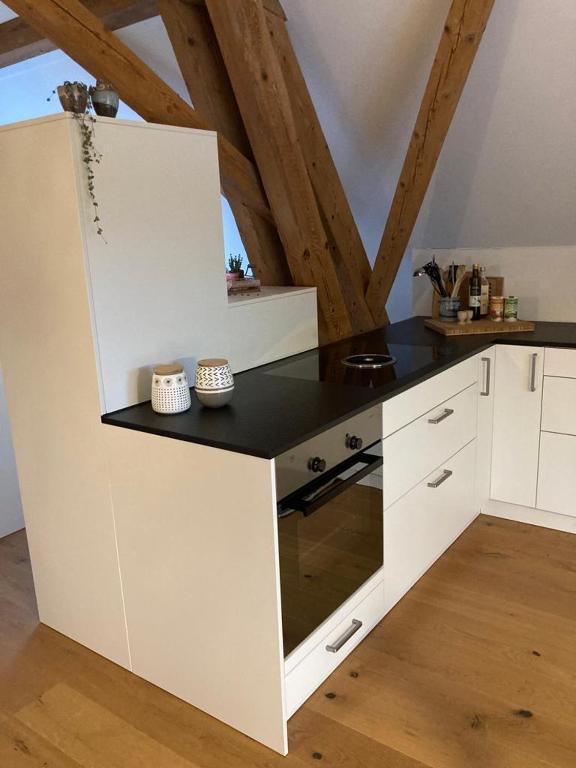 Kuchyň nebo kuchyňský kout v ubytování Ferienwohnung Burg Murten