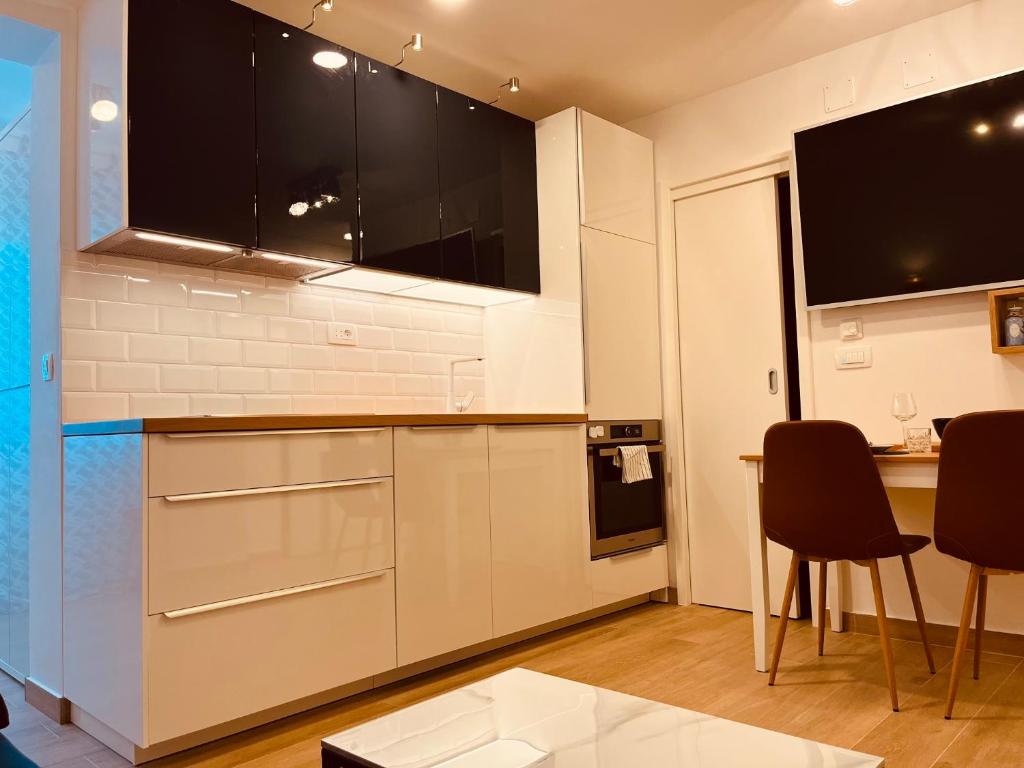 Televízia a/alebo spoločenská miestnosť v ubytovaní Apartman Lobel