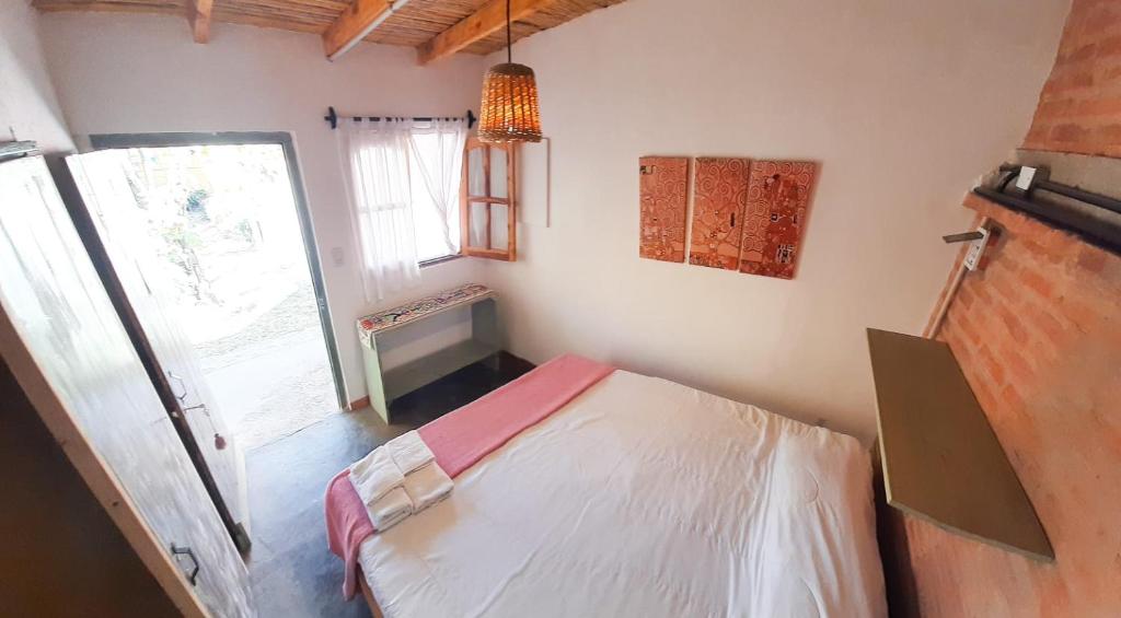 Postel nebo postele na pokoji v ubytování Cielito Lindo