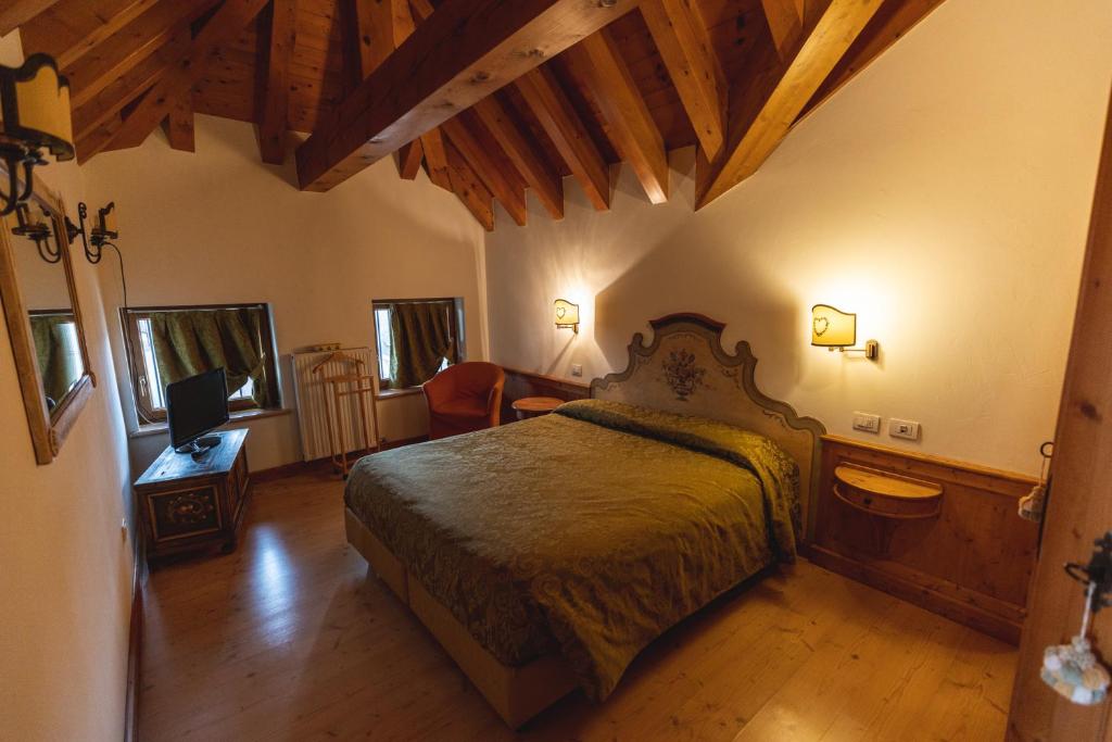 Postel nebo postele na pokoji v ubytování Hotel Europa Residence