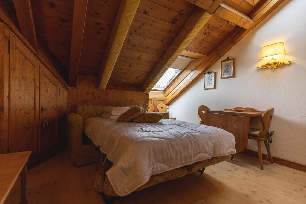 Postel nebo postele na pokoji v ubytování Hotel Europa Residence