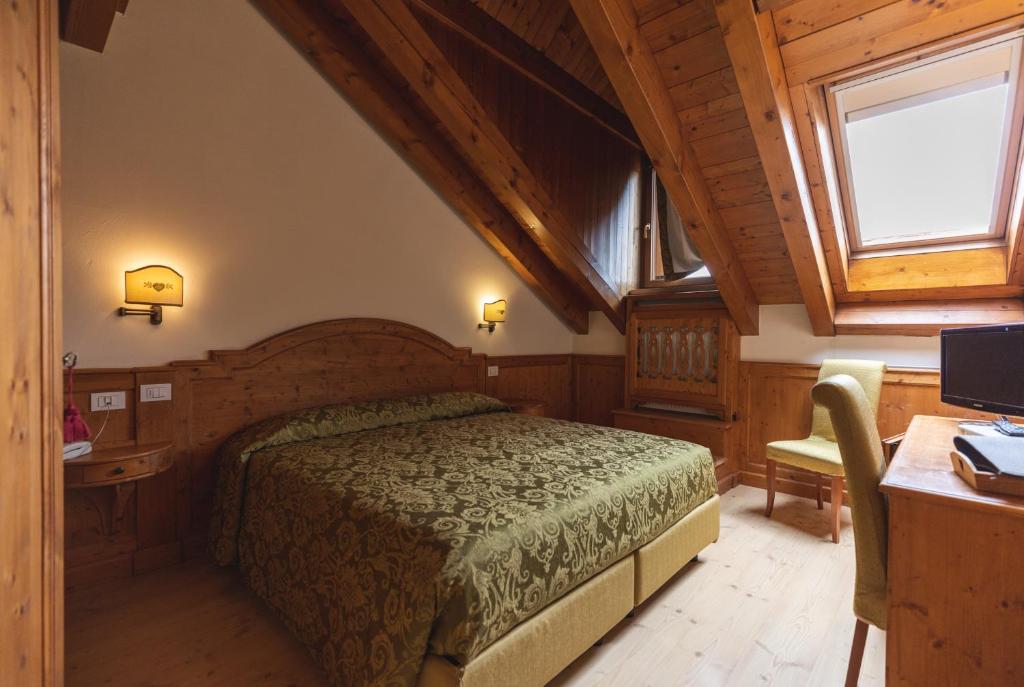 Postel nebo postele na pokoji v ubytování Hotel Europa Residence