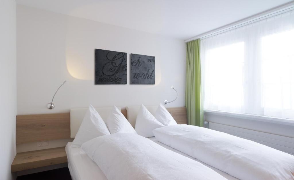 Postel nebo postele na pokoji v ubytování Anker Hotel Restaurant
