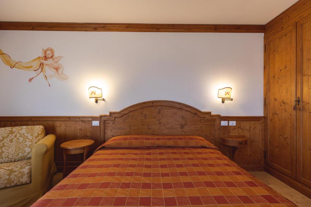 Postel nebo postele na pokoji v ubytování Hotel Europa Residence