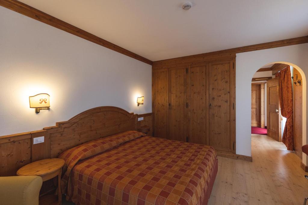 Postel nebo postele na pokoji v ubytování Hotel Europa Residence