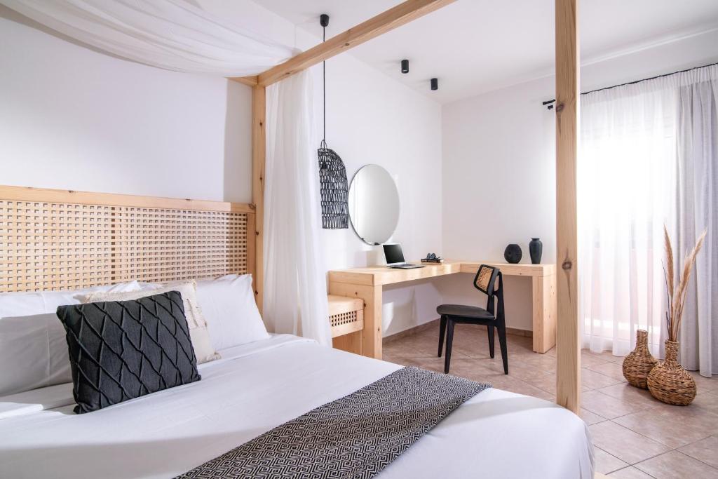 Posteľ alebo postele v izbe v ubytovaní Elèa Concept Hotel & Suites
