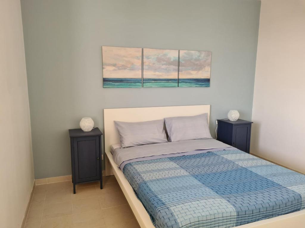 Posteľ alebo postele v izbe v ubytovaní LA FINESTRA SUL MARE