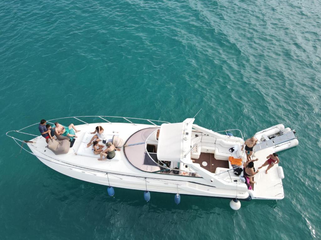 a group of people on a boat in the water at White Eagle Cruises Vourvourou Sithonia in Vourvourou