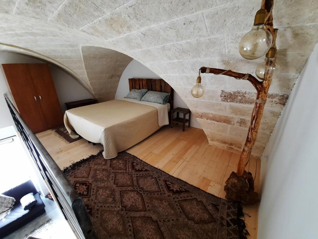 Postel nebo postele na pokoji v ubytování B&b la vecchia corte