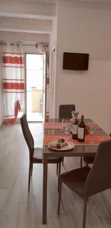 A television and/or entertainment centre at Appartamento francy
