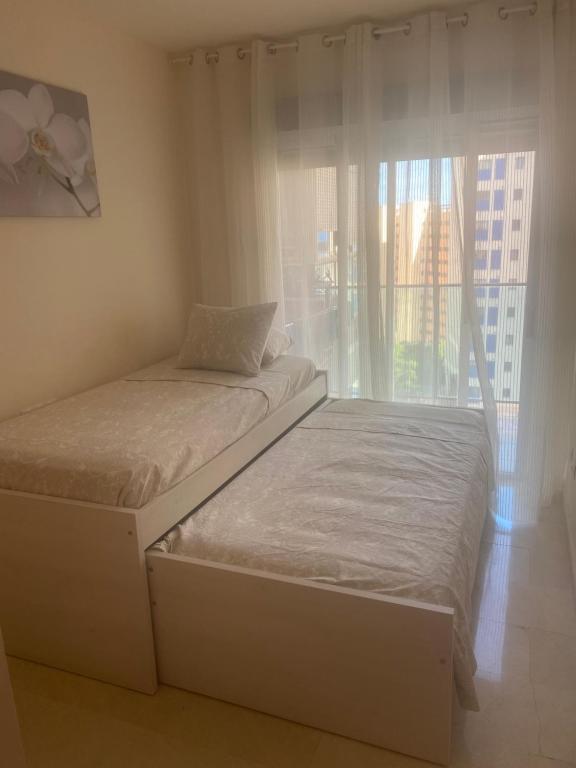 Postel nebo postele na pokoji v ubytování Apartamento Alcotan