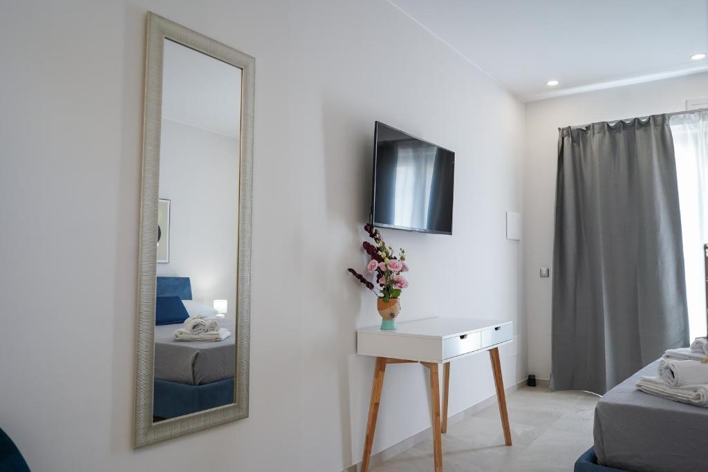 TV a/nebo společenská místnost v ubytování Thalassa Rooms