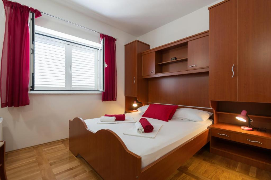 Postel nebo postele na pokoji v ubytování Guesthouse Sanela