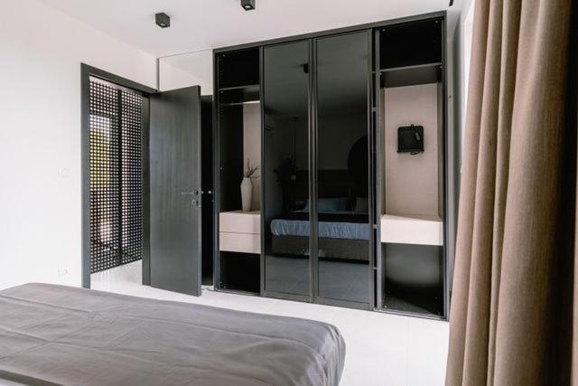 Postel nebo postele na pokoji v ubytování Villa Casa Domina
