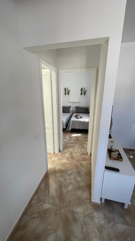 Posteľ alebo postele v izbe v ubytovaní Vivienda Vacacional Tienda Loly