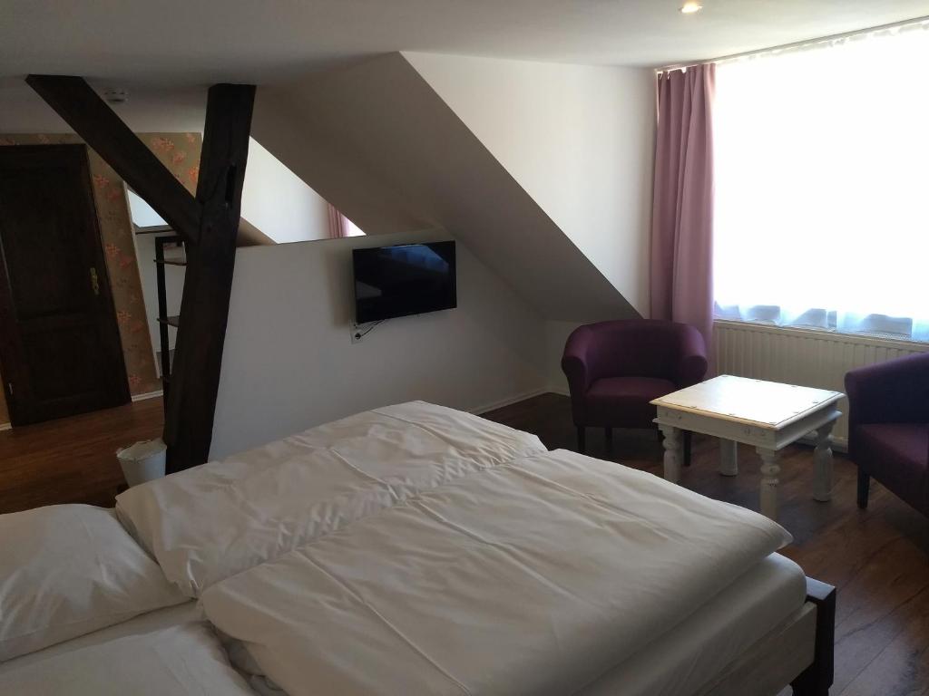 Postel nebo postele na pokoji v ubytování Das Gartenhaus