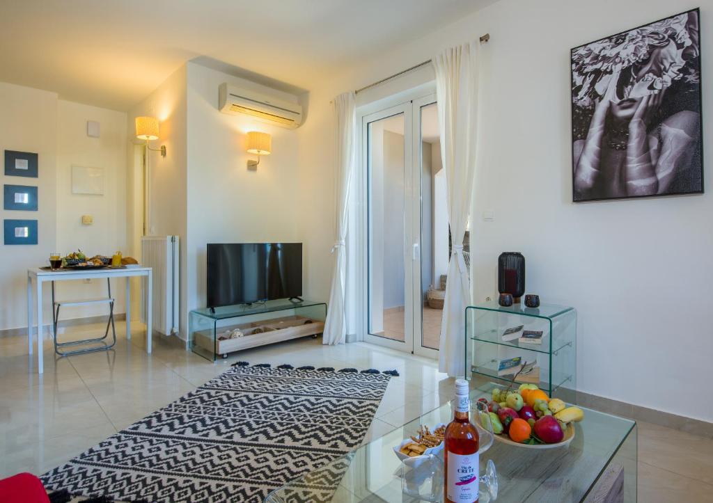 Telewizja i/lub zestaw kina domowego w obiekcie Artdeco Luxury Suites