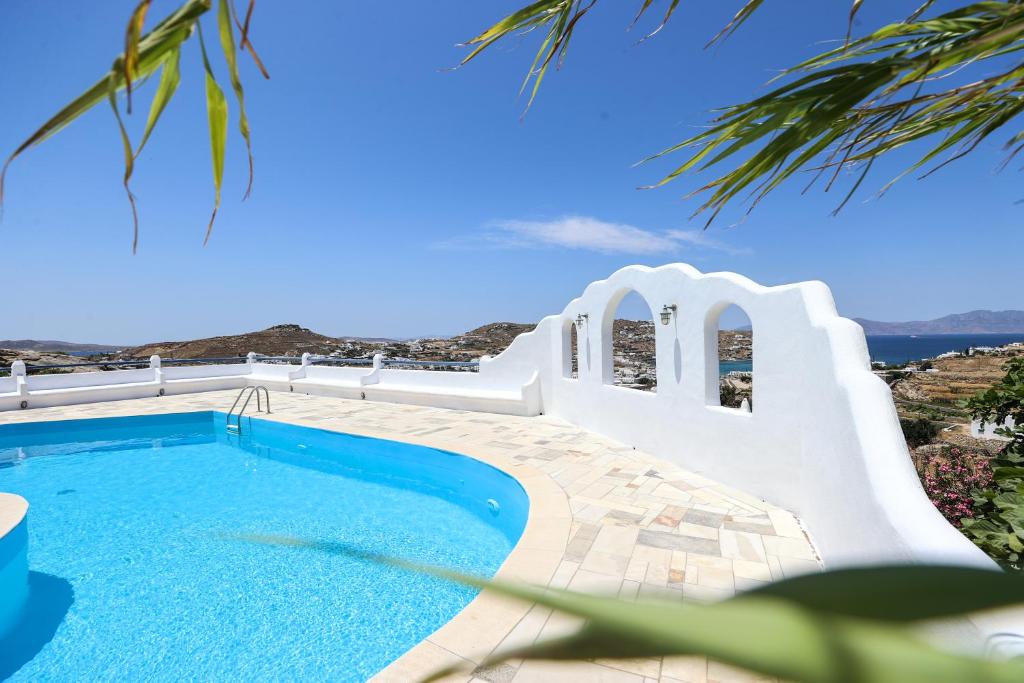 a swimming pool in a villa with a view at Mykonos in White in Mikonos