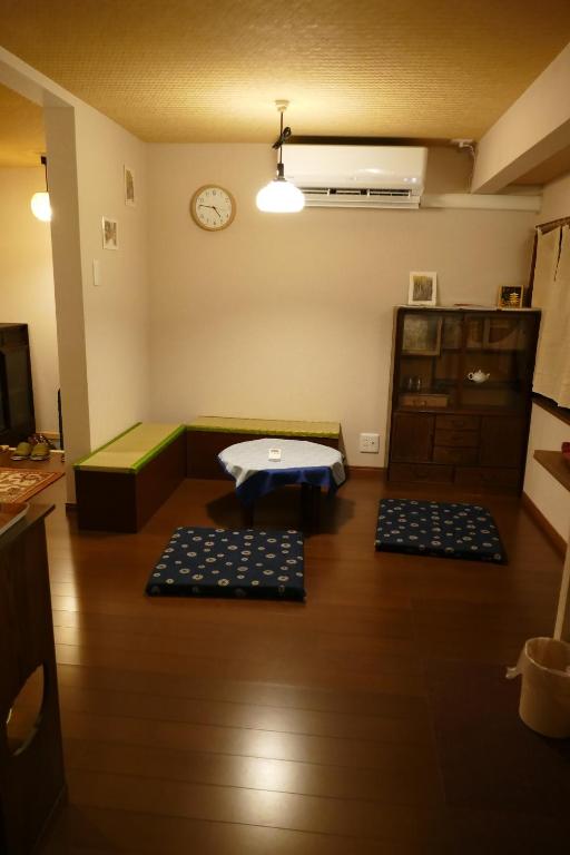 Postel nebo postele na pokoji v ubytování 東山の宿 藤屋