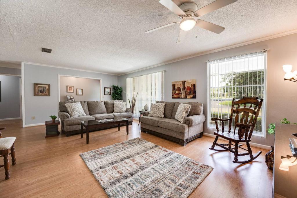 a living room with a couch and a chair at Rainey 5577 in Orange Park