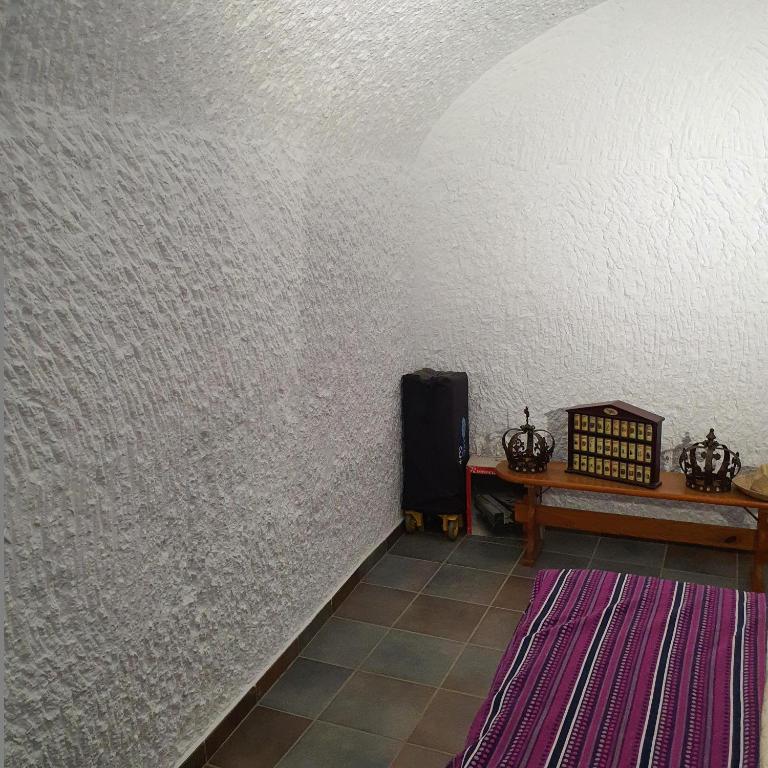 Postel nebo postele na pokoji v ubytování Cueva de Manuel