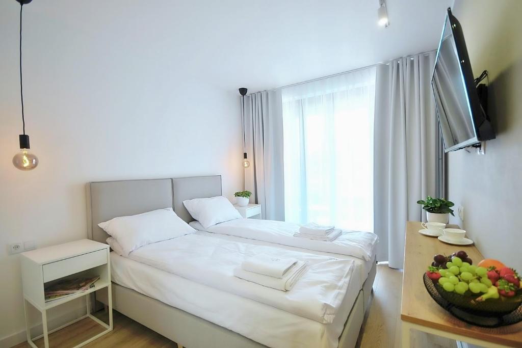 Un pat sau paturi într-o cameră la Hotel Baltic Sun