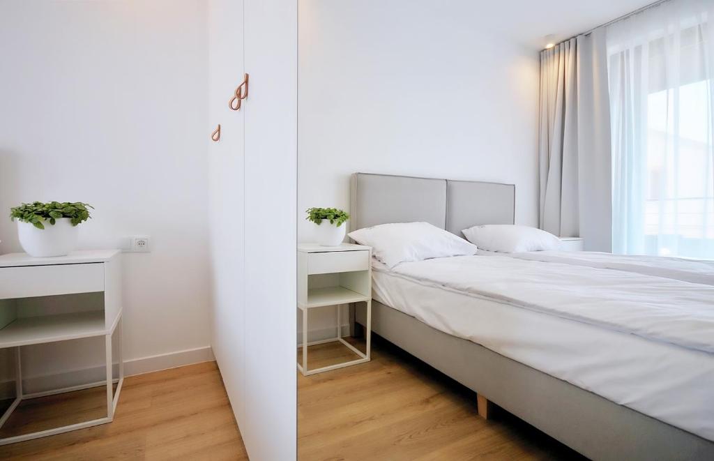Posteľ alebo postele v izbe v ubytovaní Hotel Baltic Sun