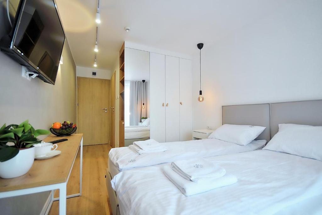 Posteľ alebo postele v izbe v ubytovaní Hotel Baltic Sun