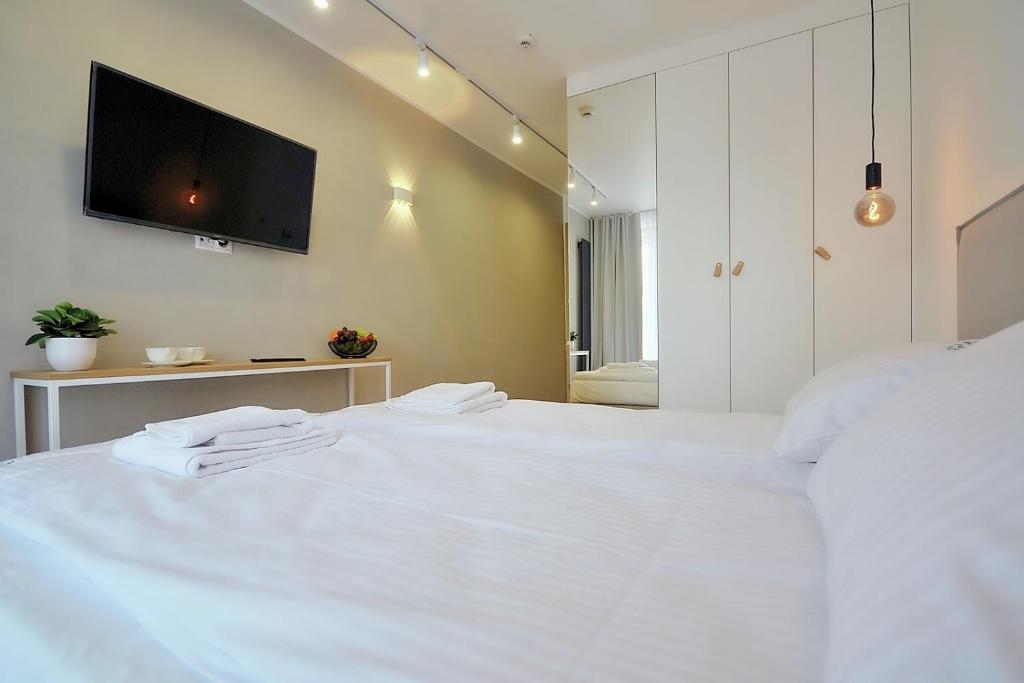Posteľ alebo postele v izbe v ubytovaní Hotel Baltic Sun