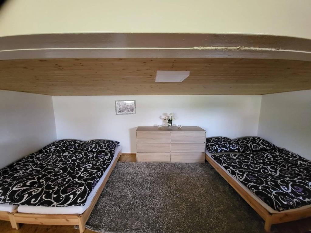 Postel nebo postele na pokoji v ubytování Apartmán u kolejí I