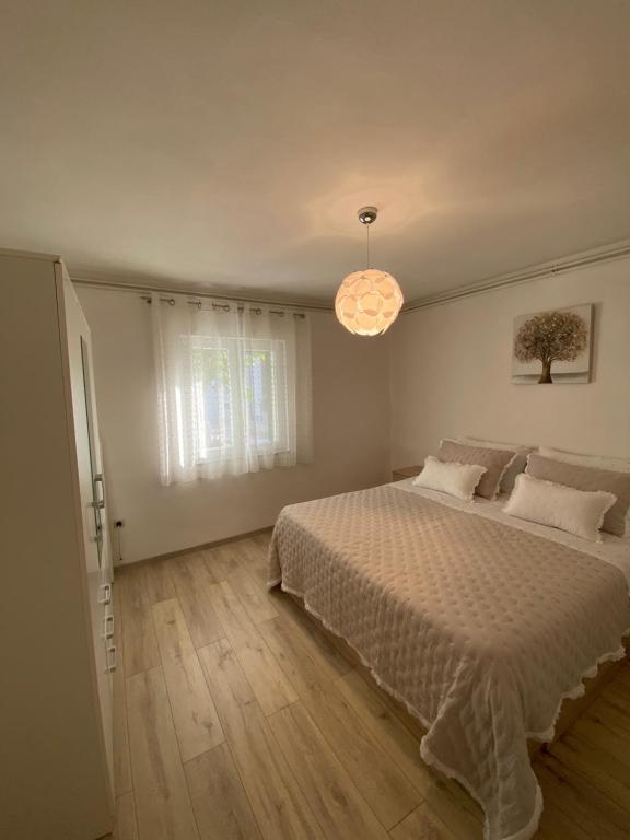Posteľ alebo postele v izbe v ubytovaní Comfy apartment in a quiet neighborhood